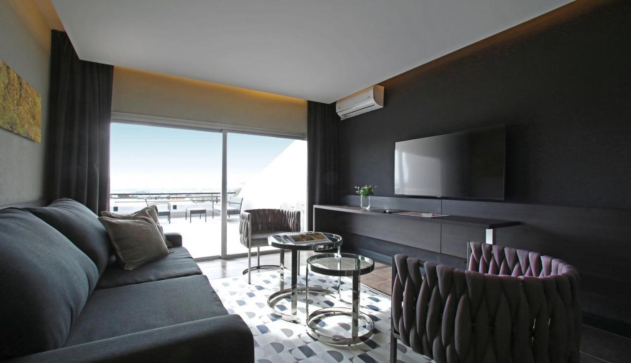 Pinares Panorama Suites, Spa & Convention Center Вилья-Карлос-Пас Экстерьер фото