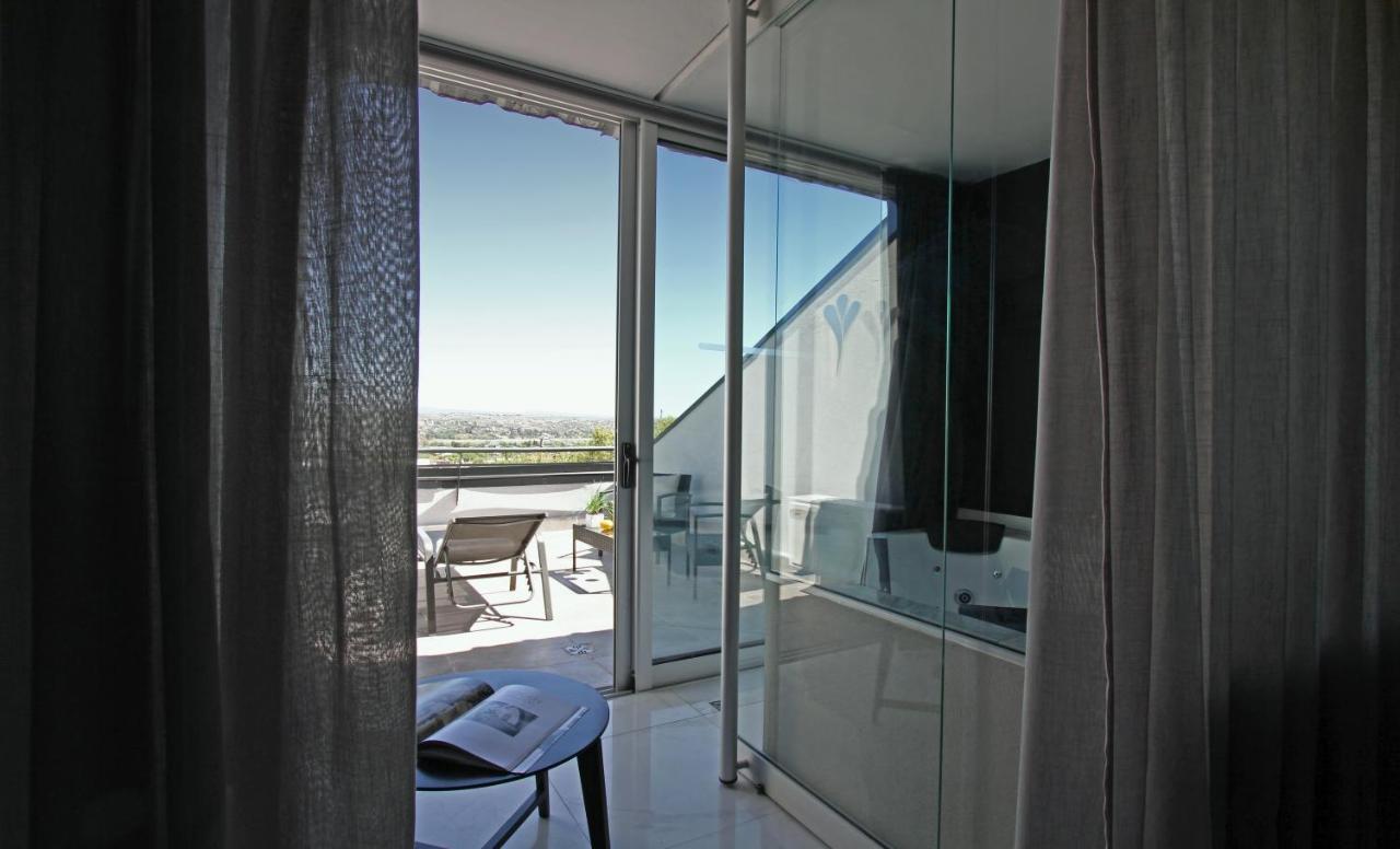 Pinares Panorama Suites, Spa & Convention Center Вилья-Карлос-Пас Экстерьер фото