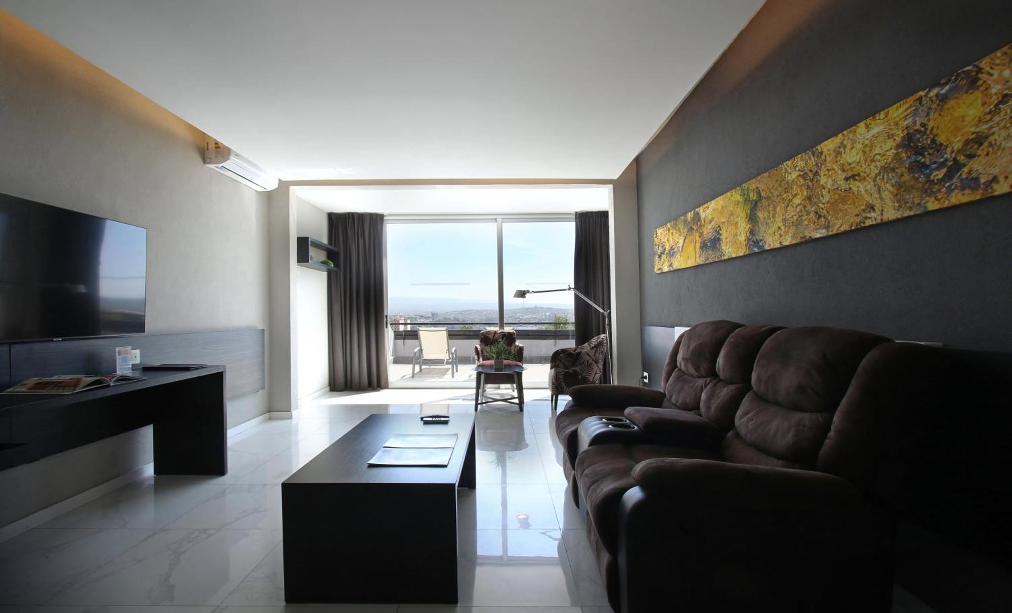 Pinares Panorama Suites, Spa & Convention Center Вилья-Карлос-Пас Экстерьер фото
