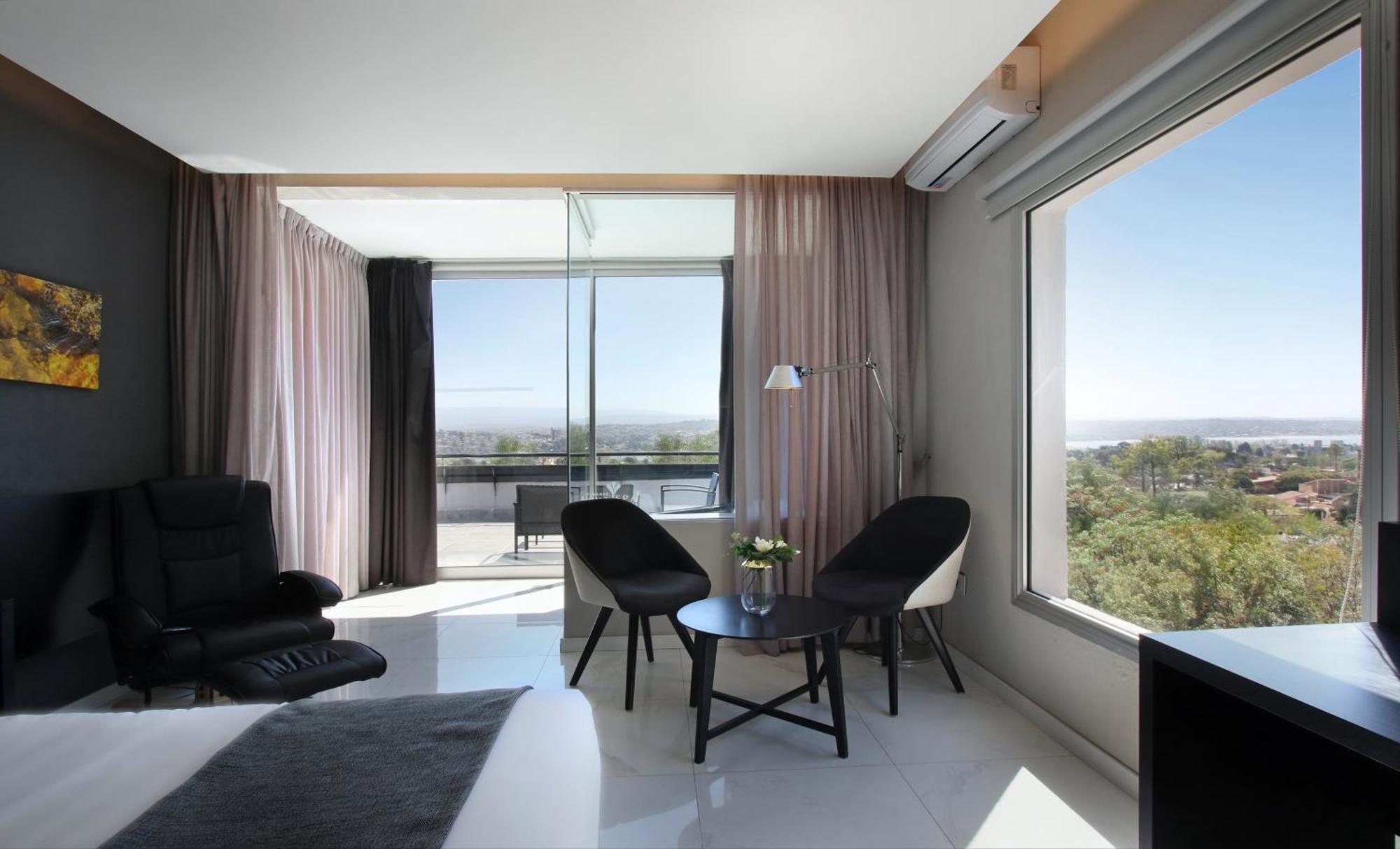 Pinares Panorama Suites, Spa & Convention Center Вилья-Карлос-Пас Экстерьер фото